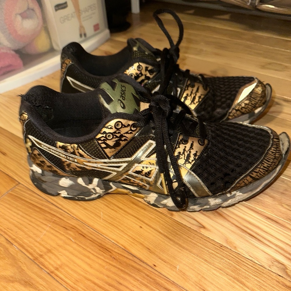 Asics Black and Gold Patterned Sneakers